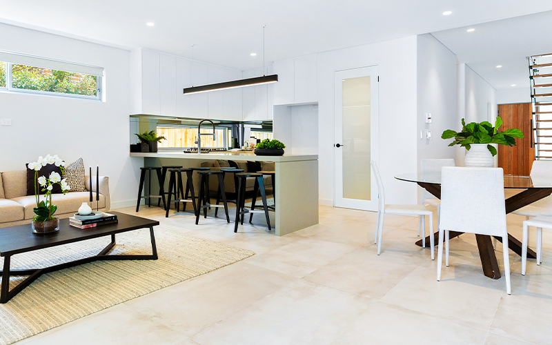 Image of a living area and kitchen by EMPCON